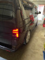 Preview: Voll LED Lightbar Design Rückleuchten für VW T5 Facelift (GP) 10-15 rot/rauch mit dynamischen Blinker